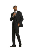Model wearing a black Stacy Adams 3-piece suit with tone-on-tone stripes, white shirt, and tie from M & R Clothing