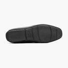 Bottom view of the black M & R Clothing Stacy Adams Sheridan patent driver slip-on shoe showing the durable outsole