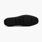 Bottom view of the M & R Clothing Stacy Adams Sheridan black patent leather driver slip-on with a durable rubber sole.