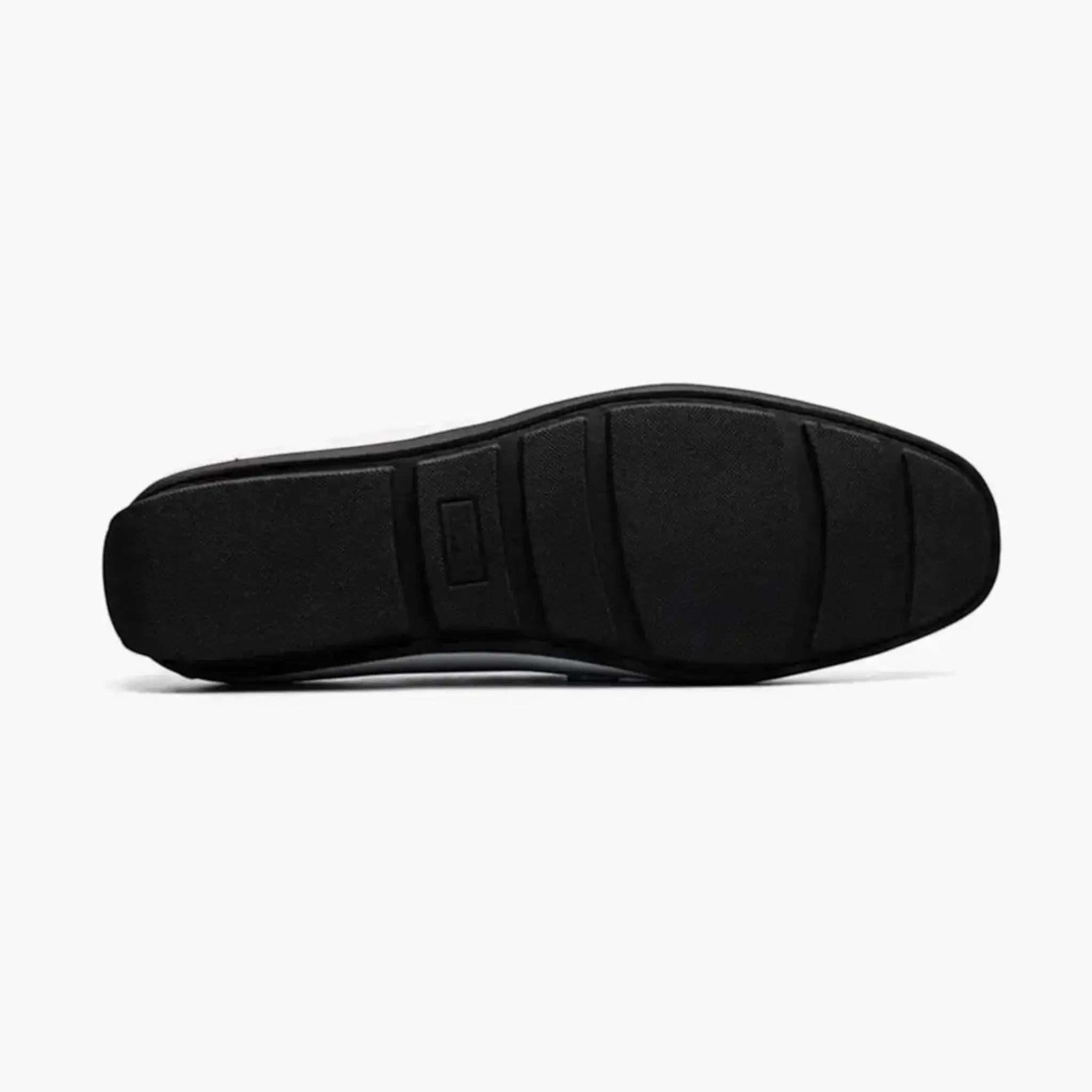 Bottom view of the M & R Clothing Stacy Adams Sheridan black patent leather driver slip-on with a durable rubber sole.