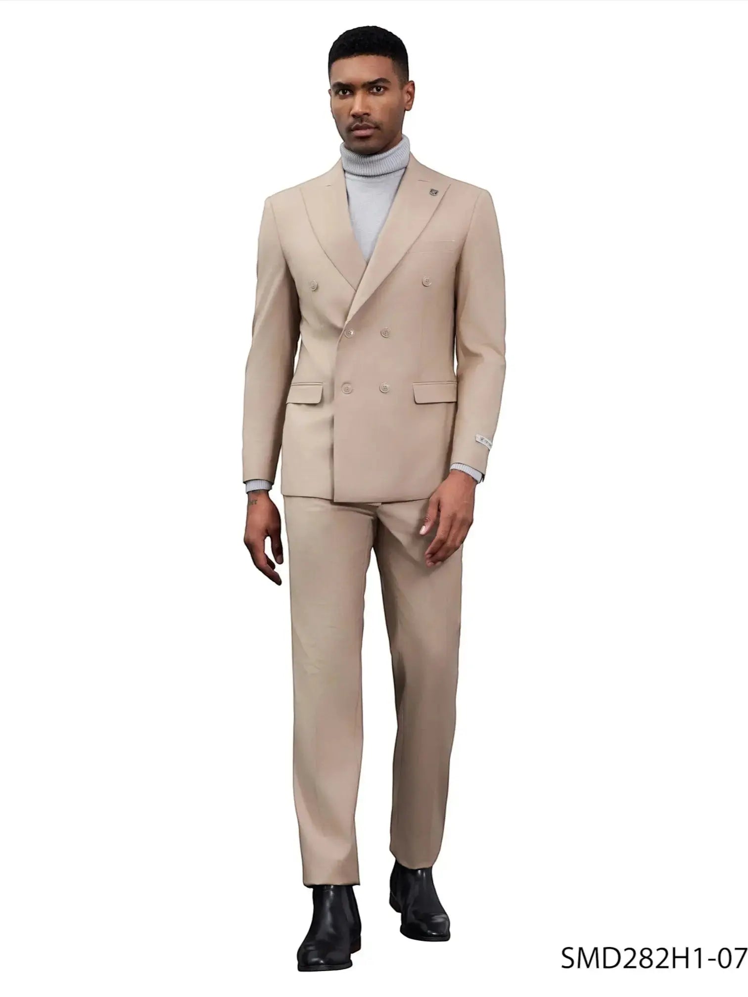 M & R Clothing Stacy Adams double breasted tan suit worn by a model with a grey turtleneck and black boots