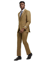 Model wearing a tan M & R Clothing Stacy Adams sharkskin 3-piece suit with a white shirt and dark loafers