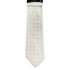 M & R Clothing Augustino tie featuring a white and gold geometric square pattern in a lustrous woven fabric