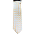 M & R Clothing Augustino tie featuring a white and gold geometric square pattern in a lustrous woven fabric