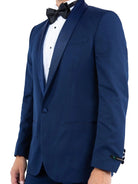 M & R Clothing Zegarie blue tailored-fit tuxedo jacket featuring a satin shawl collar and black bow tie