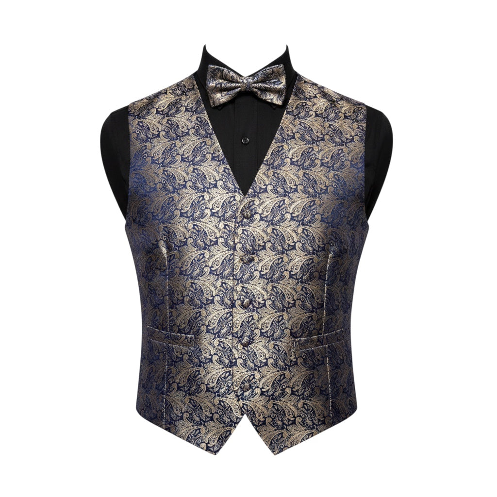 A men's formal vest with a matching bow tie, displayed on a black mannequin torso against a plain white background. The vest features an intricate, woven damask pattern in navy blue and gold, while the inner shirt is black.